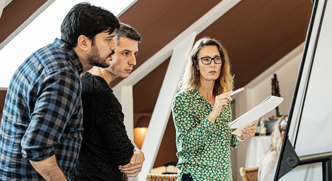 Anja Groth with members of her group during scientific discussions at a 2021 retreat.