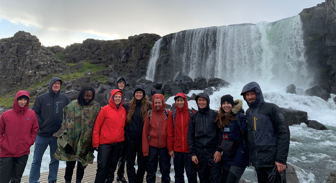 Nilson lab members in front of waterfall